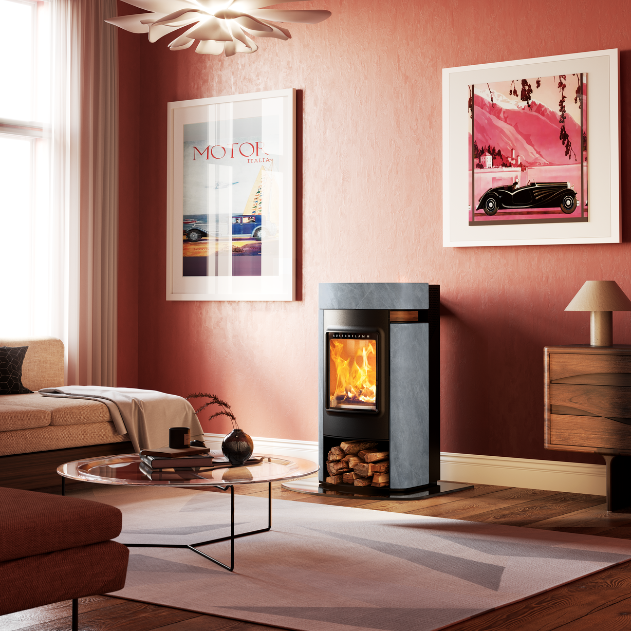 Modern living room with a wood-burning stove, framed pictures on the wall, and a sofa.