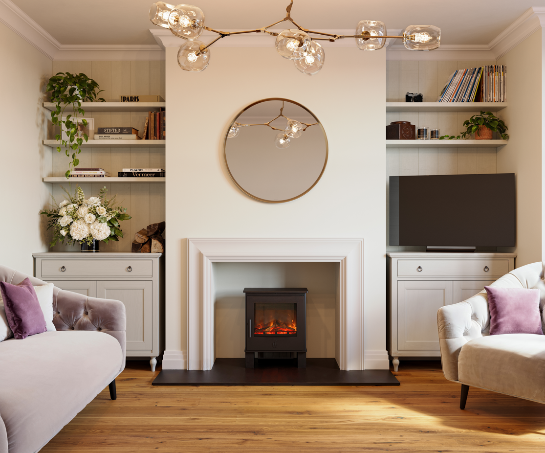 A styled living room featuring a central white fireplace with a black electric fire insert, a round gold-framed mirror above it, built-in white shelves on both sides, a modern brass globe chandelier, and two armchairs with purple pillows on a light wood floor.