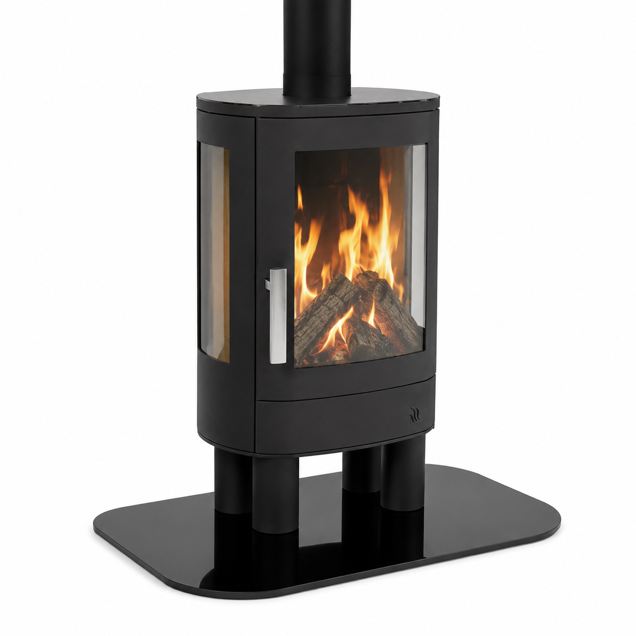 A modern black wood-burning stove with a glass front door showing a burning fire, supported by a wide black base and a vertical chimney pipe, photographed on a white background.