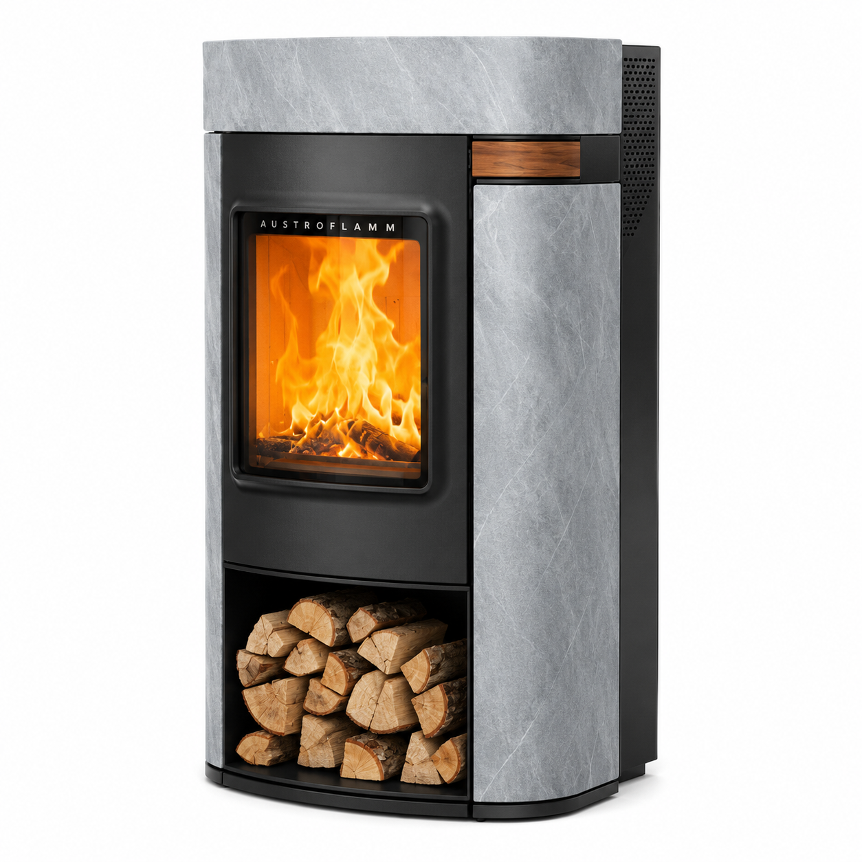 A modern Austroflamm wood-burning fireplace with a black metal frame, a glowing orange fire visible through the glass door, a lower log storage compartment filled with firewood, and a textured gray side panel.