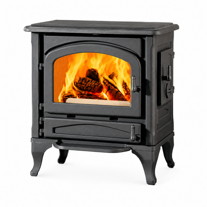 A black cast iron wood-burning stove with an arched glass door showing a bright orange and yellow fire inside, set against a plain white background.