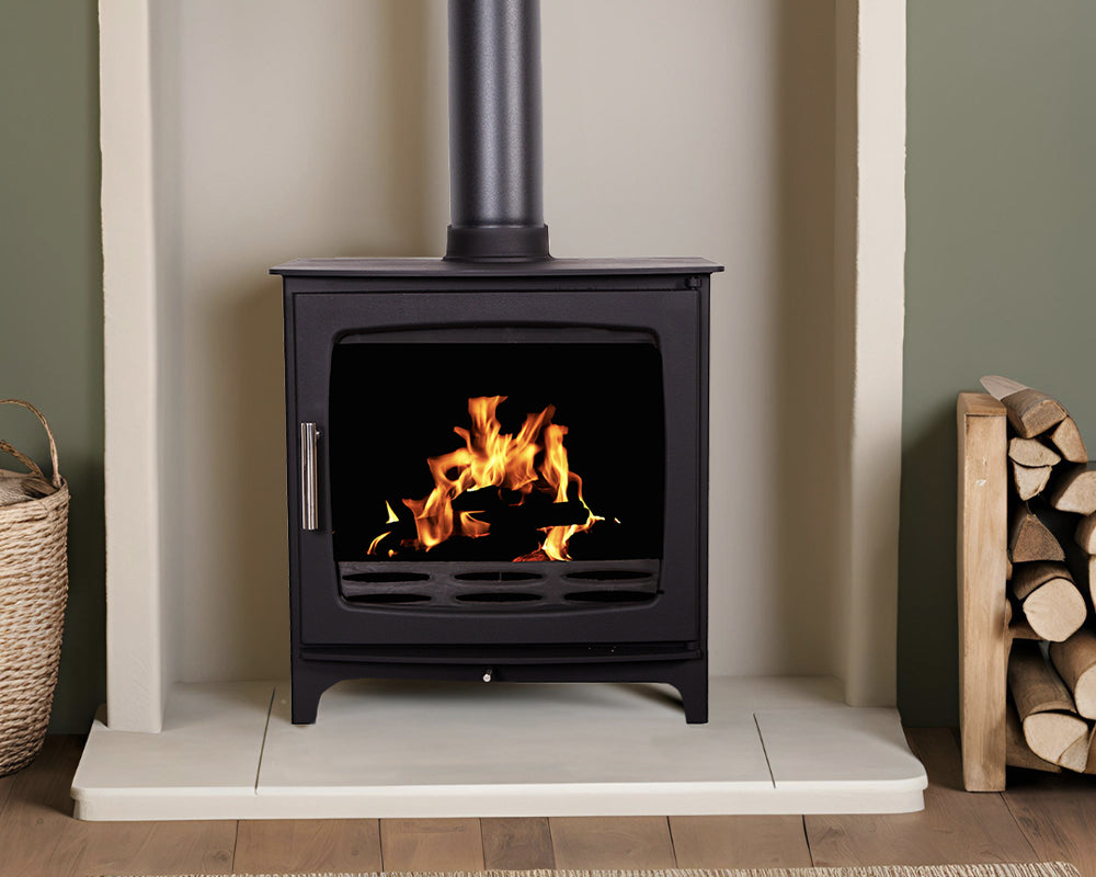 Carron wood stove in fireplace
