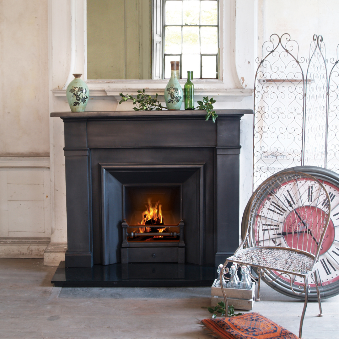 Carron Somerset Black fireplace with a fire burning inside, mantle 