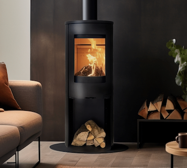 Explorer C5 310  Stove with Logstore in a modern living room with a sofa and logs.
