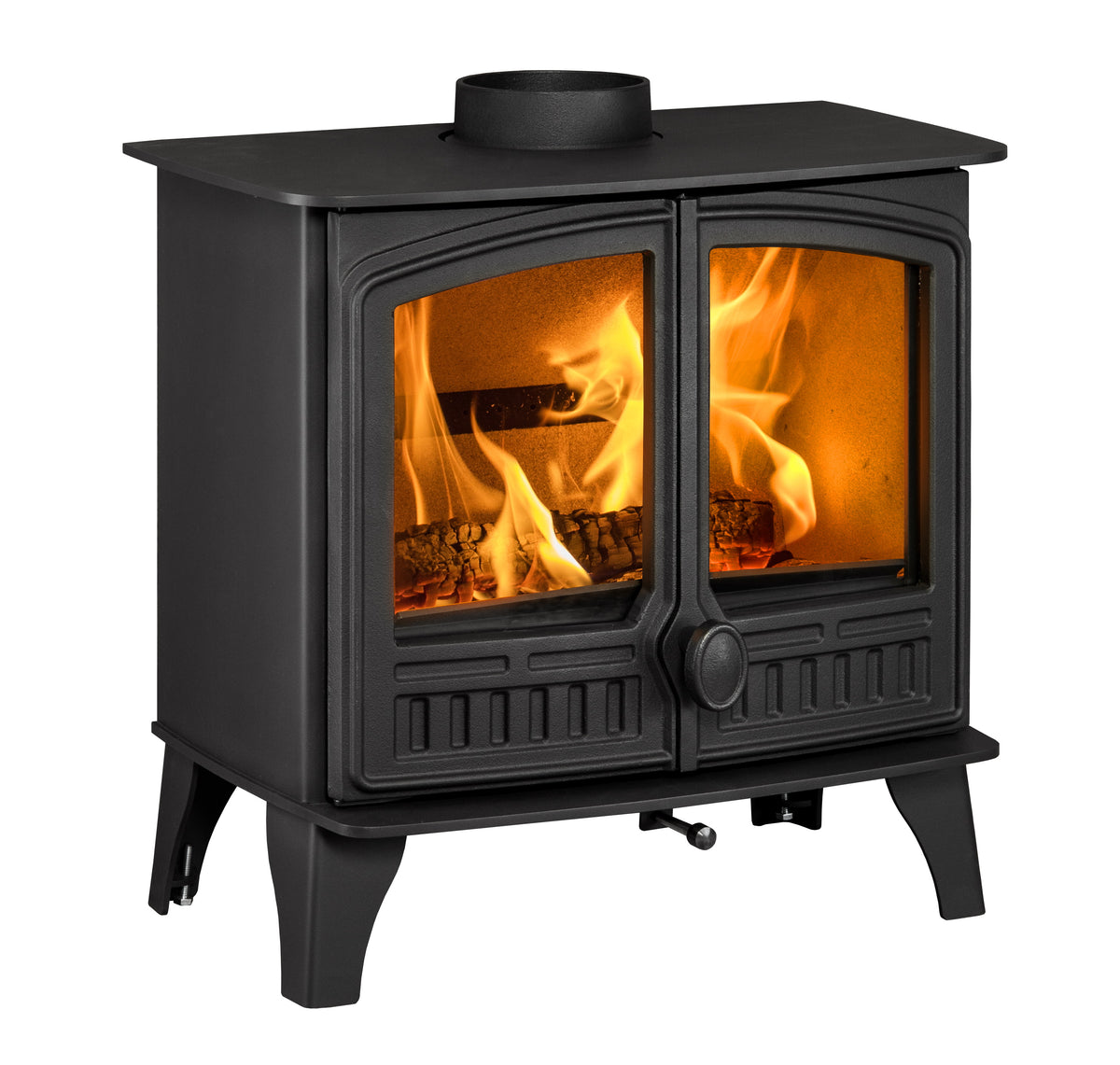 A black cast iron wood-burning stove with two glass doors showing bright orange flames and logs inside, isolated on a white background.