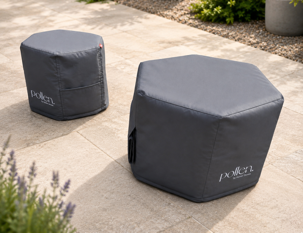 Two hexagonal outdoor covers with 'pollen' branding on a stone patio.