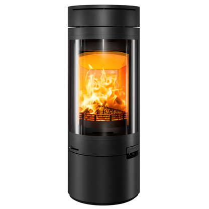 A modern cylindrical black wood-burning fireplace with a large glass front door showing a glowing orange and yellow fire inside, set against a plain white background.