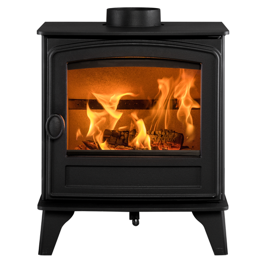 A black cast iron wood-burning stove with a glass front door showing bright orange flames and logs, isolated on a white background.