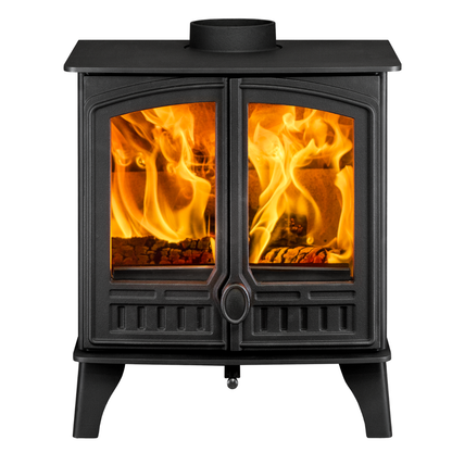 A black cast iron wood-burning stove with two glass doors showing bright orange and yellow flames, set against a solid white background.
