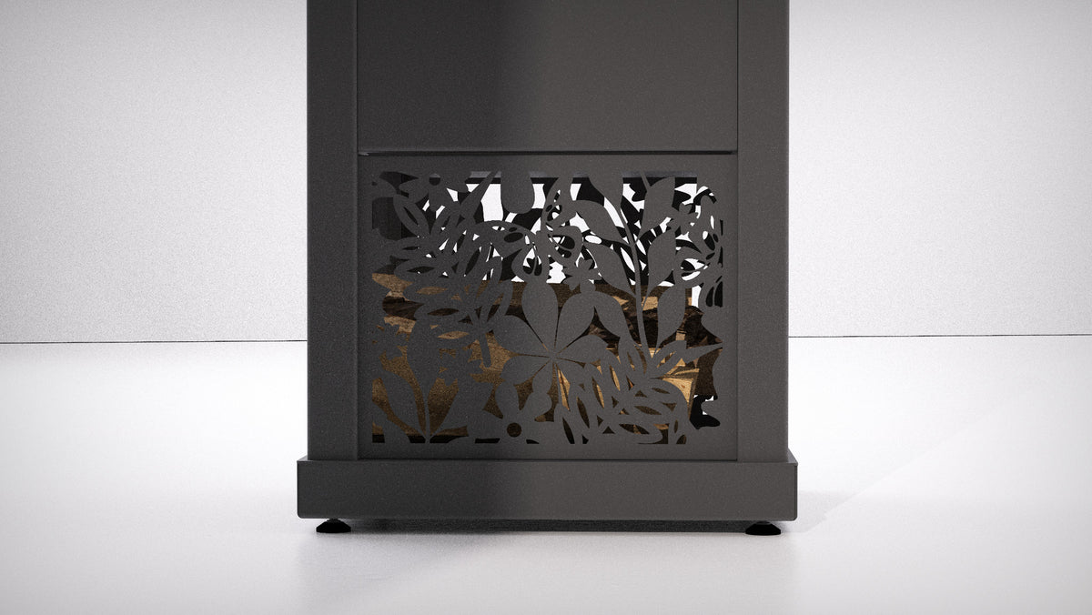 A modern slate grey outdoor stove log storage with a decorative patterned laser-cut front panel, shown against a clean white studio background.