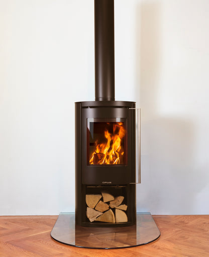Opus Aria Log burner and store on a glass hearth