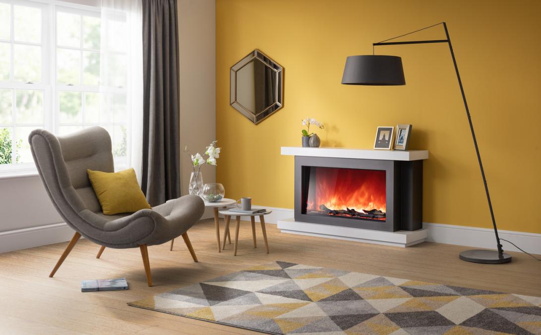 Rayburn Stratus 100-44 XT. Modern living room with yellow wall, fireplace, and grey armchair.