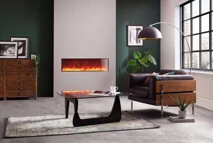 Rayburn Stratus 100-30 XS Extra Slim Electric Fire. Red fire with chair, rug and coffee table