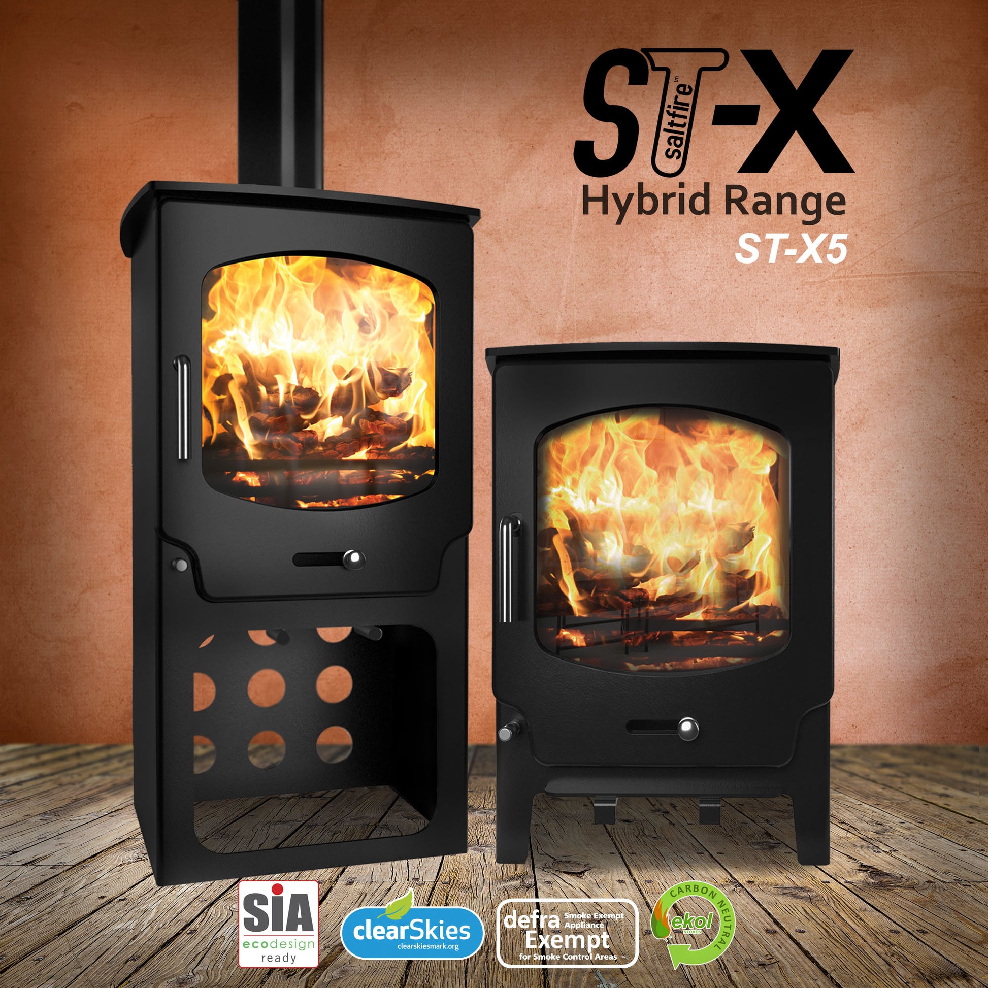 Two Saltfire ST-X5 hybrid range cook stoves with flames inside, on a wooden floor against an orange wall.