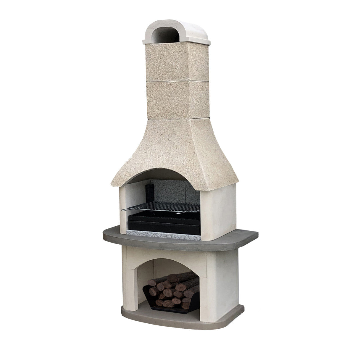 A freestanding outdoor stone barbecue grill with a chimney and lower firebox, set in a patio garden with plants, a dining table, and seating visible.